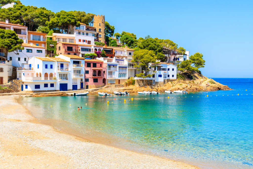 colorful houses in sea bay with beach in sa tuna coastal village